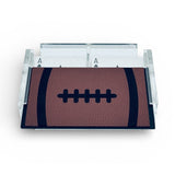 Card holder shaped like a football on a white background